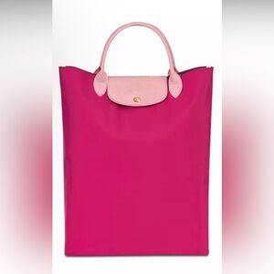 Longchamp
Le Pliage Re-Play Top Handle Bag